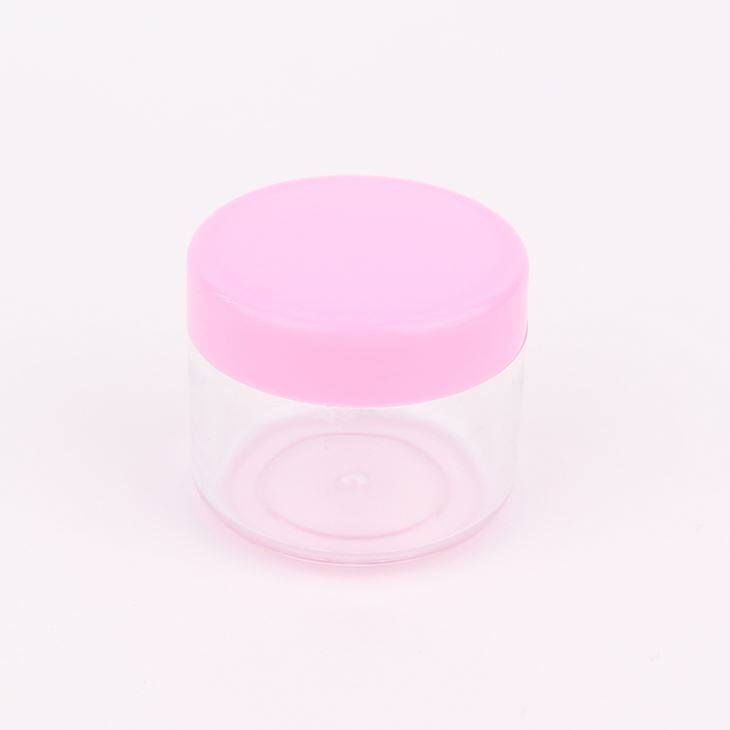 Pote de pó claro com tampa rosa