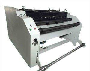 Slipmaskin med slipande tyg för klaffskiva