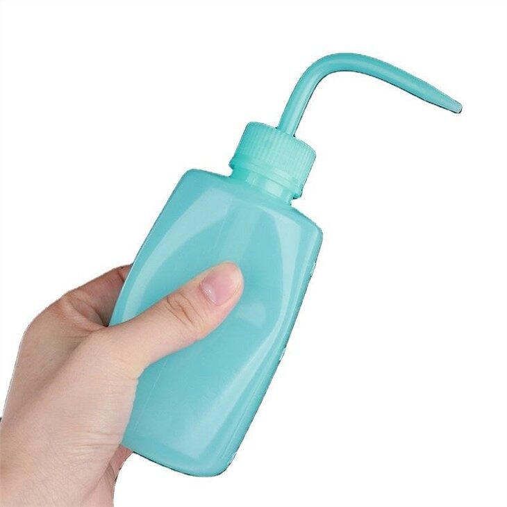 blue lash rinse bottle