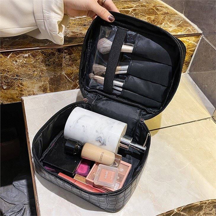 black makeup handbag