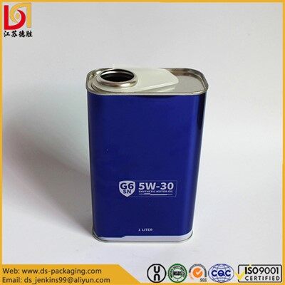 Llaunes d'oli de motor buides