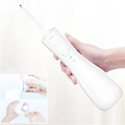 Bærbar oral irrigator