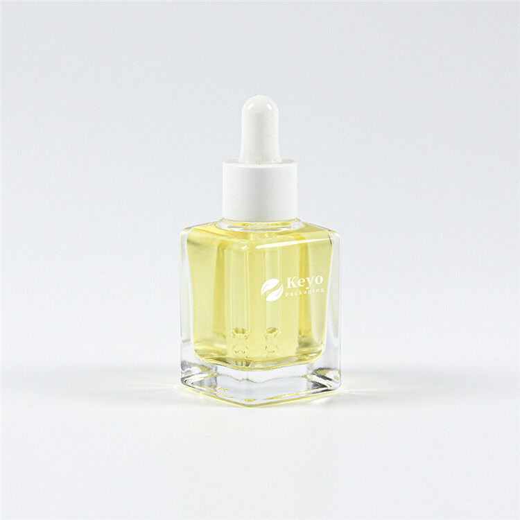 Прозора скляна пляшка-крапельниця