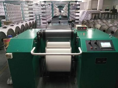 Direct Warper for Rigid Yarns