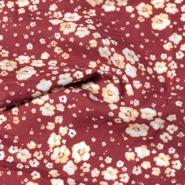 पुष्प प्रिंट लाल कपड़े