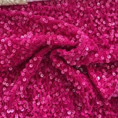 Pinkfarbener Samtstoff mit Paillettenstickerei