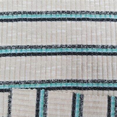 Vikerkaare ribi kootud kangas