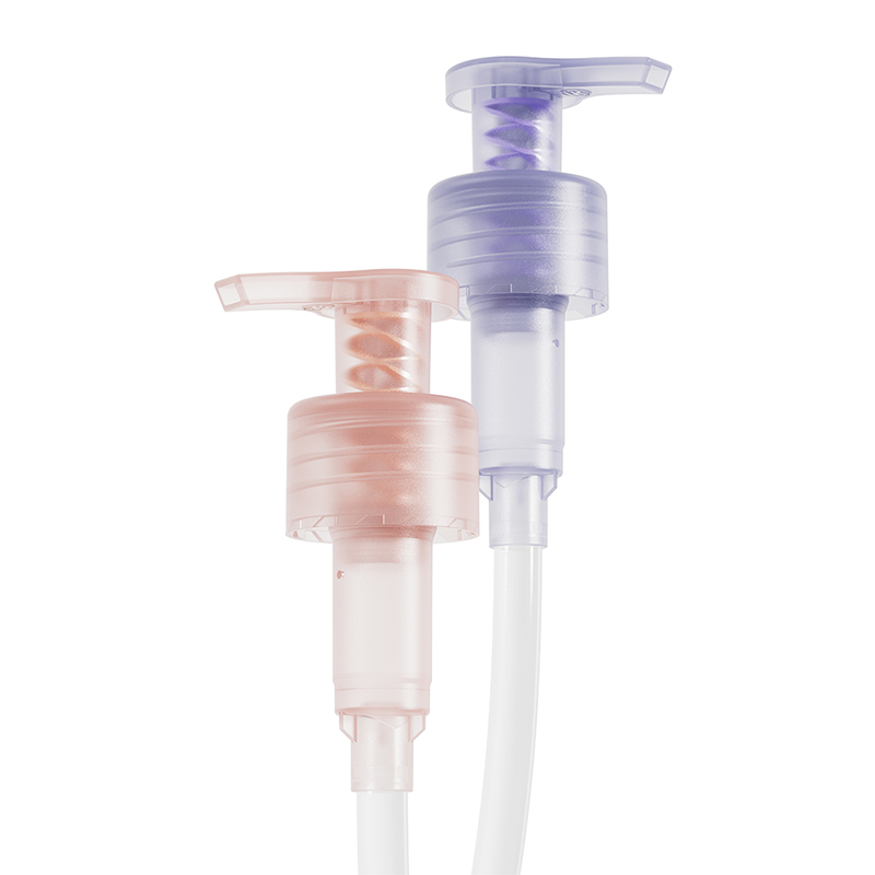Close-up view of recyclable lotion pumps showing the innovative metal-free plastic spring mechanism utilized for eco-friendly dispensing.
