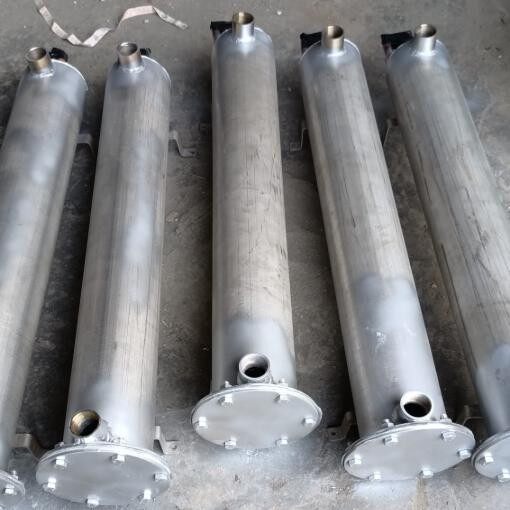 Double - loop shell and tube evaporator