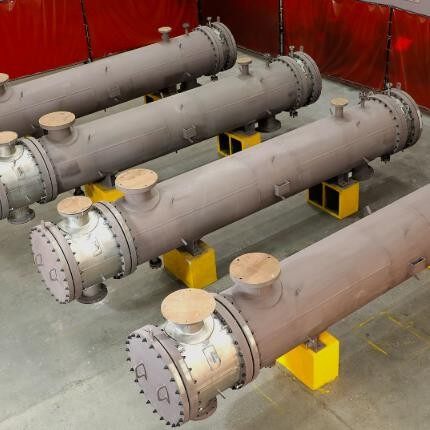 Titanium coil evaporator assembly