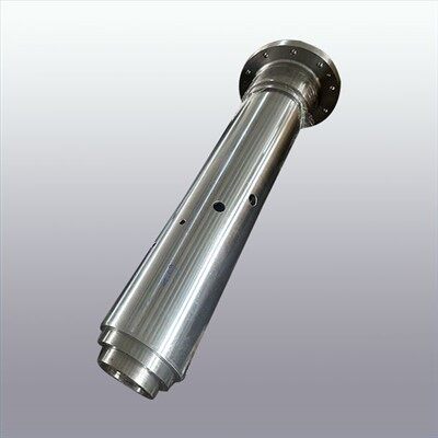 Központi forgó tengely pajzsgéphez