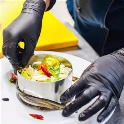 Guanti usa e getta in plastica nera