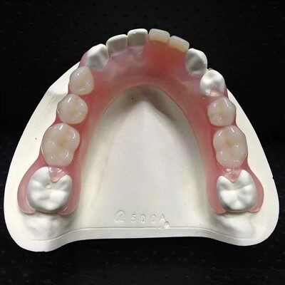 Tvíhliða tannplasts tannlækningar