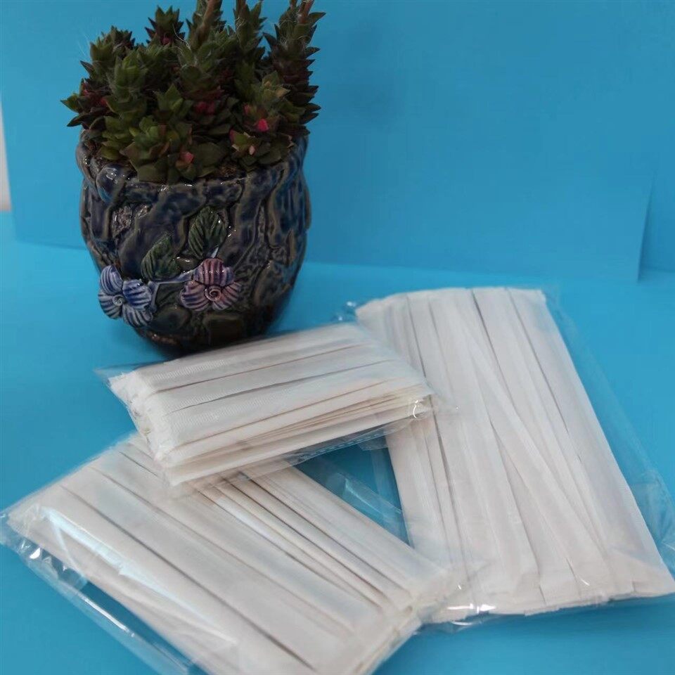 Įvyniotas kavos lazdelės popierius